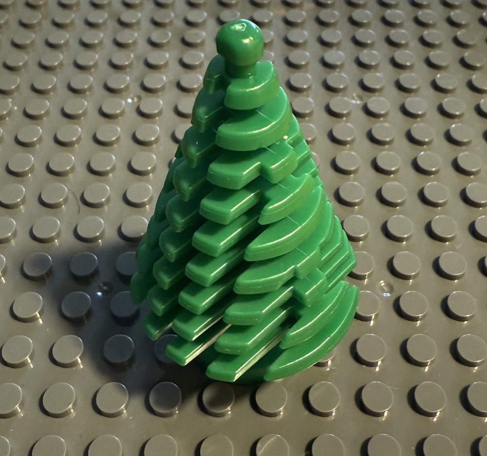 Der Baum kann, z.B. auf einer Grundplatte, befestigt werden (Grundplatten separat erhältlich).