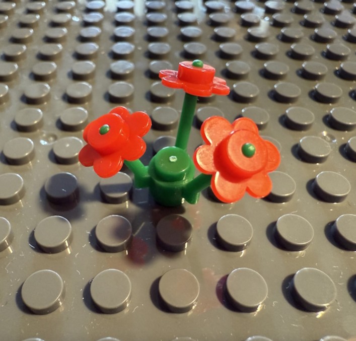 Die Blume kann, z.B. auf einer Grundplatte, befestigt werden (Grundplatten separat erhältlich).