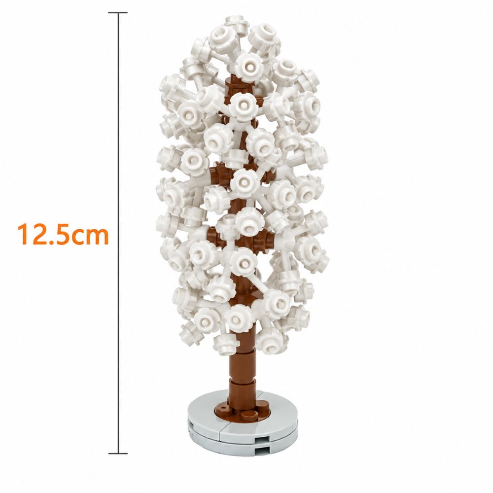 The tree from building blocks is thin, has a height of 12.5cm and has a rather narrow, long crown.