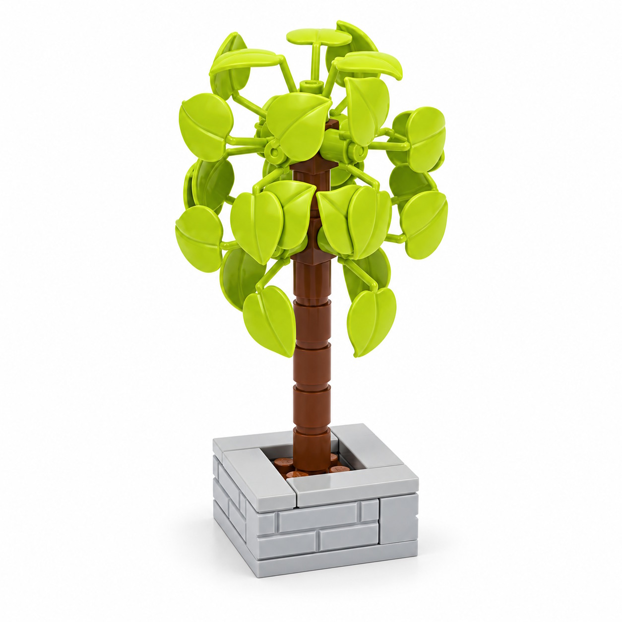 Der Baum aus Klemmbausteinen ist schlank, und hat einen Pflanzkübel